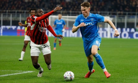 Napoli’s Scott McTominay (right) takes on Youssouf Fofana at San Siro.