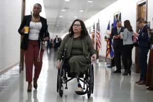Senator Tammy Duckworth, R-Ill., arrives for a briefing on Capitol Hill in Washington, Thursday, March, 12, 2020, on the coronavirus outbreak.