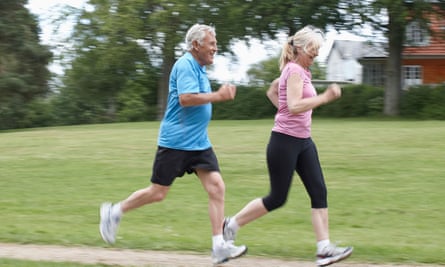 Models release: Older couple jogging together outdoors