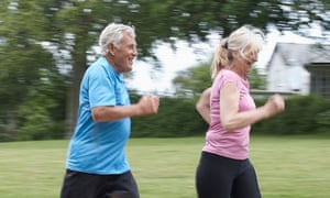 An older couple jogging