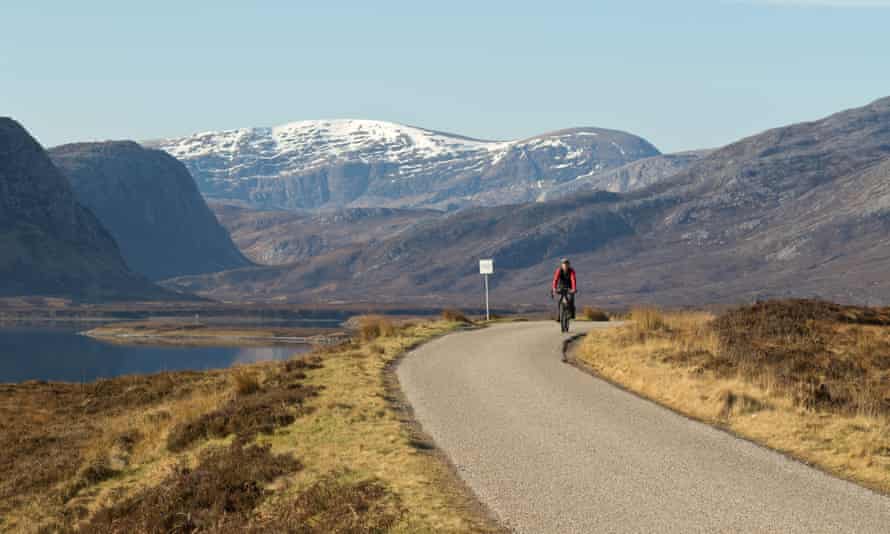 A cyclist on North Coast 500 along Loch Eriboll.