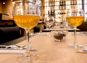 Glasses of cider on a table at Le Comptoir Breizh Café, Saint-Malo, France