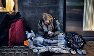 Jane, with her pole cat Troy, found homeless on Oxford Street in central London.
