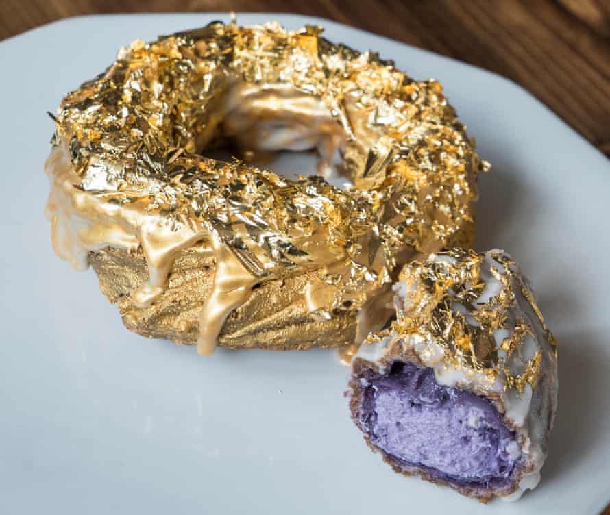 Björn DelaCruz’s gold-covered doughnut with ube filling.