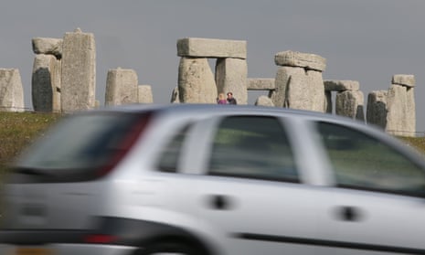 Traffic passing Stonehenge on the A303 road in Wiltshire.