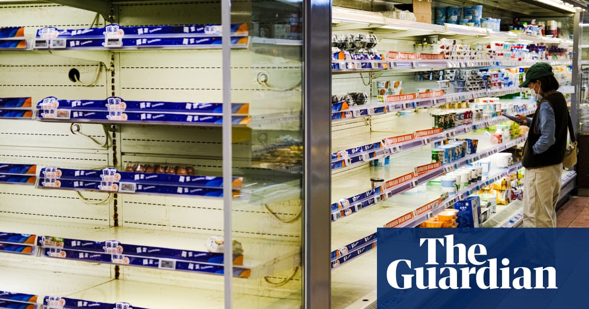 Hong Kong shops ration food and drugs to curb panic buying amid Covid lockdown fears