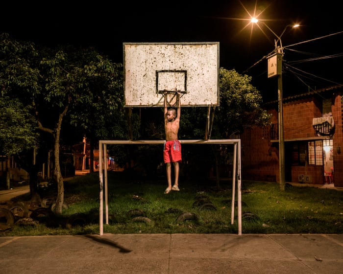 A boy clowning around on a basketball court in a Colombian cocaine corridor: Mads Nissen’s best photograph