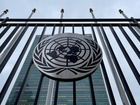 The logo of the United Nations is seen on a wrought iron fence outside the headquarters.