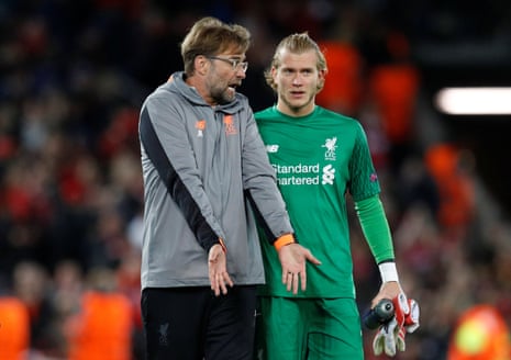 Juergen Klopp has words with Loris Karius after the match.