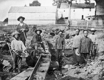 Black and white photo of a group of gold miners at a sluice box, Aubine Ravine, California, 1852