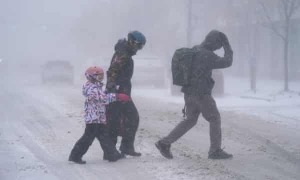 Huge 'bomb cyclone' storm hits US with life-threatening cold as holidays begin | US weather | The Guardian