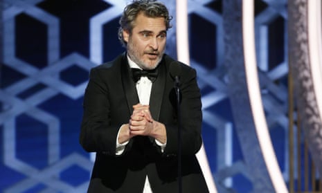 This image released by NBC shows Joaquin Phoenix accepting the award for best actor in a motion picture drama for his role in “Joker” at the 77th Annual Golden Globe Awards at the Beverly Hilton Hotel in Beverly Hills, Calif., on Sunday, Jan. 5, 2020. (Paul Drinkwater/NBC via AP)