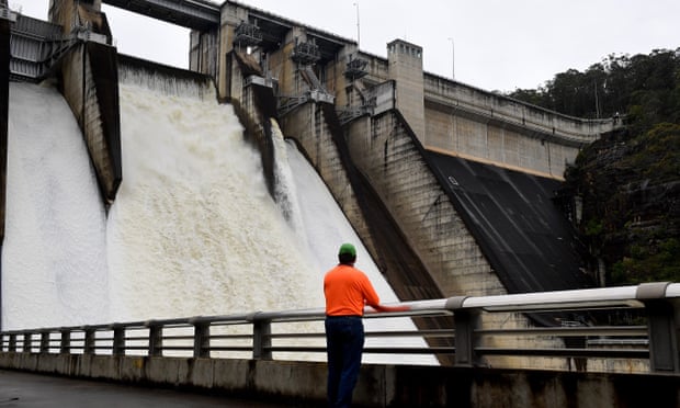 A worker monitors the spillway outflow of Warragamba Dam in Sydney in November. 