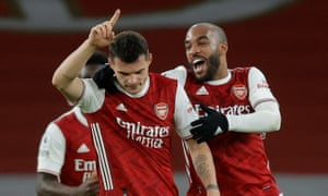 Granit Xhaka is congratulated by fellow goalscorer Alexandre Lacazette.