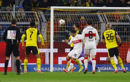 Deniz Undav hooks the ball past Dortmund’s Gregor Kobel.