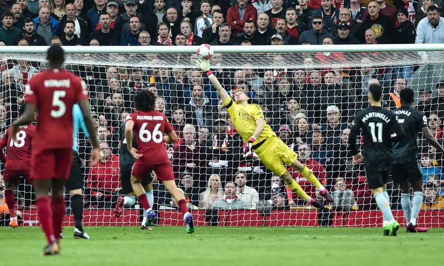 Arsenal’s Aaron Ramsdale tips the ball over the bar late in the game against Liverpool.