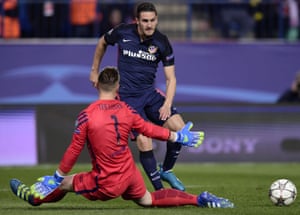 Atlético Madrid’s Koke beats Barcelona’s goalkeeper Marc-Andre Ter Stegen to the ball.