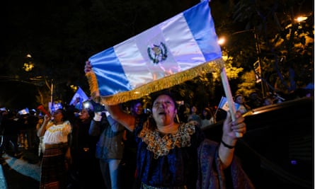 Supporters of the winning Semilla party celebrate the election results in Guatemala City.