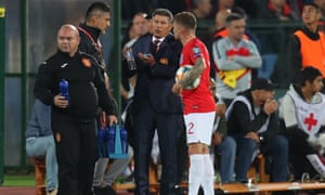 Trippier talks to the Bulgaria manager Krasimir Balakov during England’s game in Sofia last month