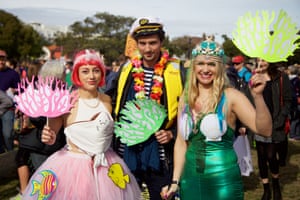 Protestors in fancy dress at the #climatefizza rally.