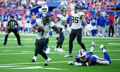 Travis Etienne runs in for one of his two touchdowns against Buffalo Bills