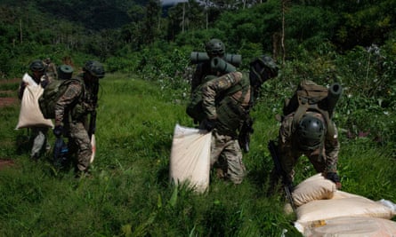 Members of the Peruvian Armed Forces destroy a clandestine airstrip in the VRAEM.