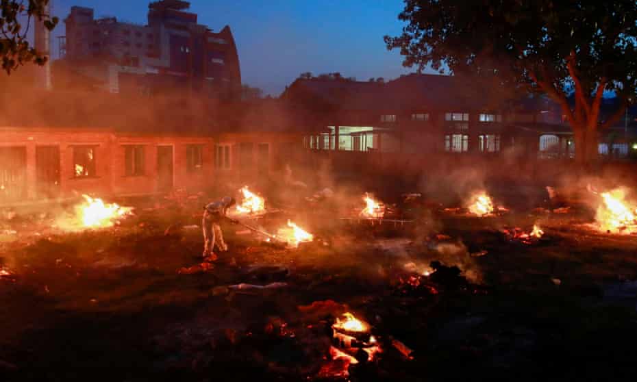 A mass cremation of Covid victims is held on the grounds of Pashupatinath temple in Kathmandu.