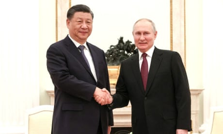 Vladimir Putin greets Xi Jinping at the Kremlin in Moscow this week