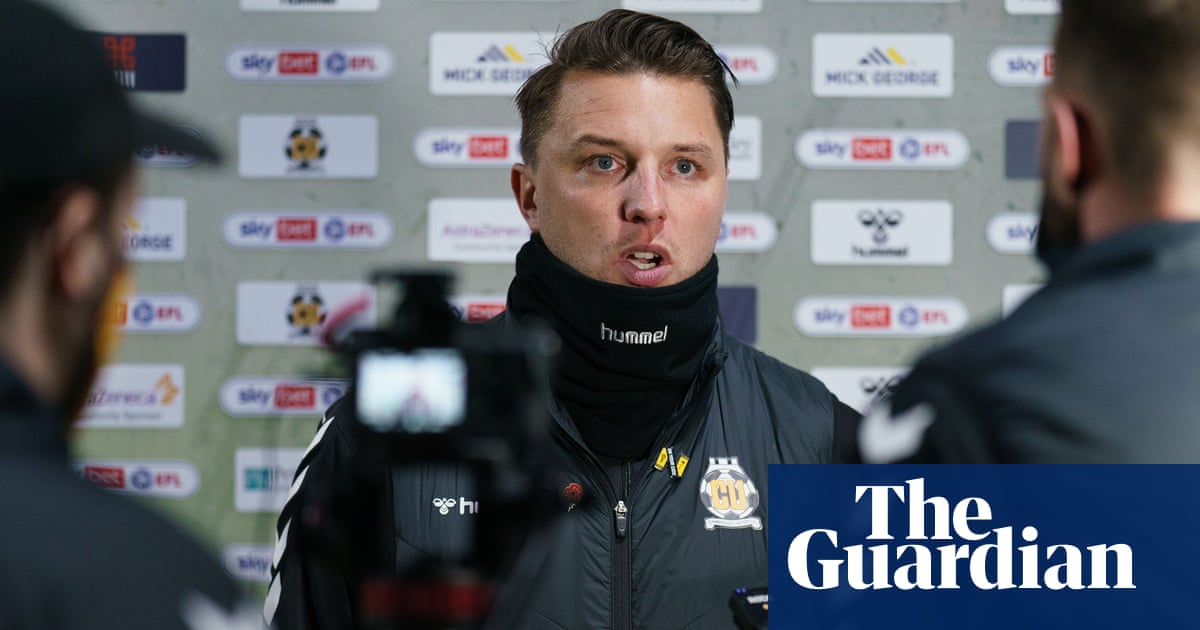 Cambridge manager condemns fans after players booed for taking the knee