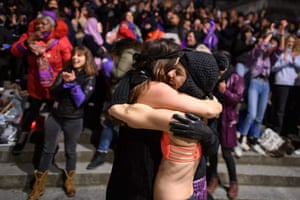 Women react after performing the song Un violador en tu camino (a rapist in your path) during a flashmob celebration in Lausanne, Switzerland
