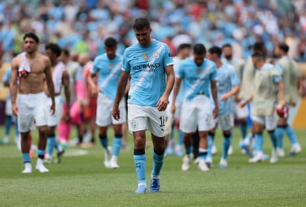 Rodri walks off after playing for Manchester City against Wydad.