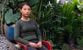 0Leonela Moncayo, 14, sitting in a red plastic chair.