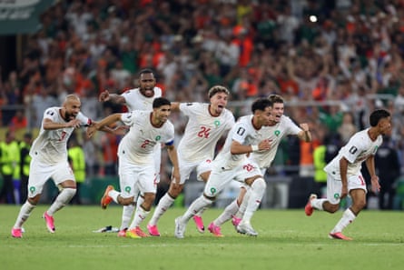 Morocco players set off after Ismael Saibari at the conclusion of the shootout.