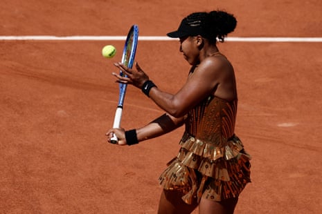 Naomi Osaka fires off a forehand to Donna Vekic.