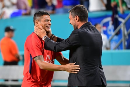 Thiago Silva is greeted by former Milan mentor Paolo Maldini during a match between PSG and Juventus in Miami.