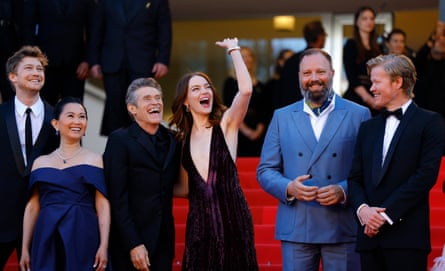 Director Yorgos Lanthimos, second right, and cast members Joe Alwyn, Hong Chau, Willem Dafoe, Emma Stone and Jesse Plemons arrive for the Cannes screening of the ‘brilliantly unsettling’ Kinds of Kindness.