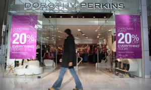 a shopper passes Dorothy Perkins