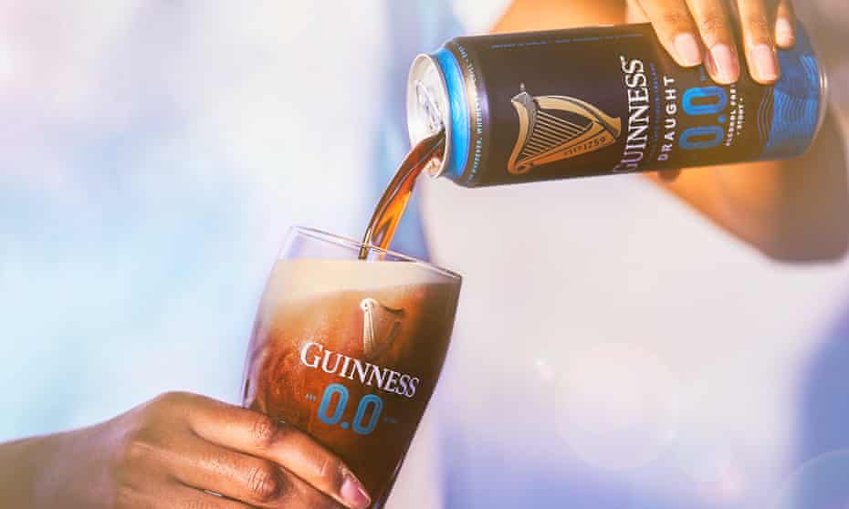 Guinness being poured into glass