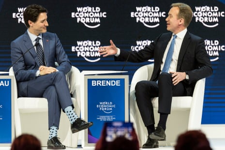 World Economic Forum 2018 in Davosepa06468389 Prime Minister of Canada Justin Trudeau (L) and Borge Brende (R) from Norway, President and Member of the Managing Board of the World Economic Forum, WEF, during a plenary session during the opening day of the 48th Annual Meeting of the World Economic Forum, WEF, in Davos, Switzerland, 23 January 2018. The meeting brings together entrepreneurs, scientists, corporate and political leaders in Davos from 23 to 26 January. EPA/LAURENT GILLIERON