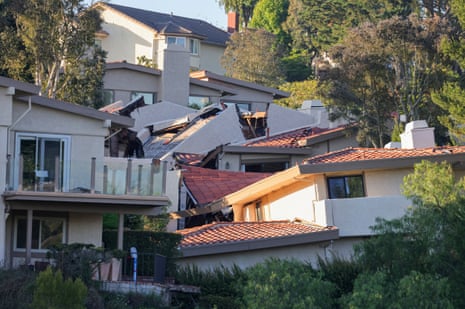 Damaged houses, which were evacuated due to a growing fissure causing a landslide, in the Rolling Hills Estates, California.