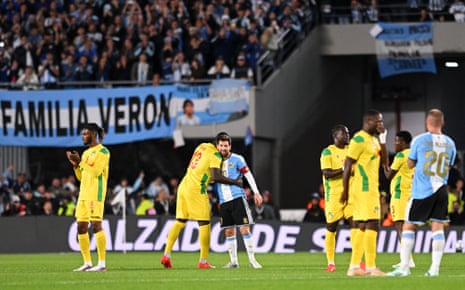 International Friendly - Argentina v BeninSoccer Football - International Friendly - Argentina v Benin - Estadio Monumental, Buenos Aires, Argentina - October 6, 2026 Argentina's Lionel Messi with Benin's Mohamed Tijani as the match is stopped at the 10th minute for a standing ovation during his final international match REUTERS/Rodrigo Valle