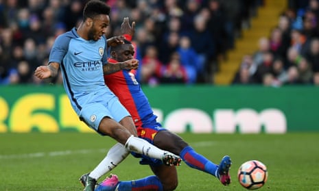 Manchester City’s Raheem Sterling scores the opening goal against Crystal Palace.