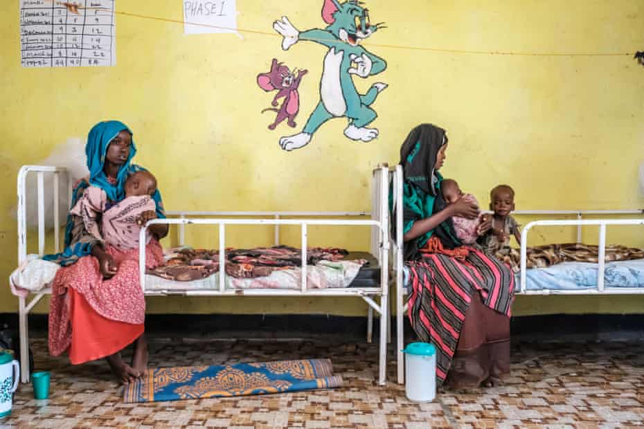 Women and children at the nutrition unit of the Kelafo health centre, Ethiopia, April 2022.  Levels of child malnutrition are increasing, aggravated by the effects of drought.