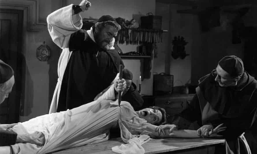 Monks hammer a stake into the heart of the vampire in Dracula: Prince of Darkness (1966)