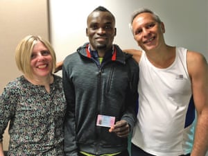 Jimmy Thoronka celebrates getting his UK ID card with Taylor and Hattenstone.