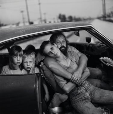 A family of four packed into their car in Los Angeles.