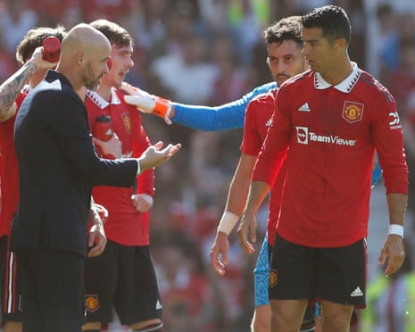 Erik ten Hag speaks with Cristiano Ronaldo during a pre-season friendly between Manchester United and Rayo Vallecano in July 2022