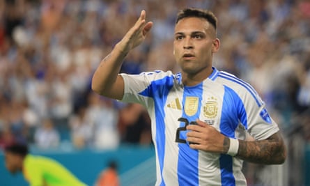 Lautaro Martínez celebrates after scoring one of his two goals against Peru