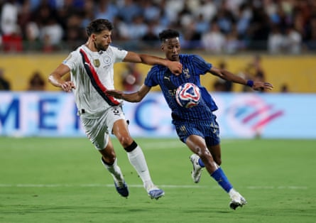 Rúben Dias in action with Al Hilal’s Nasser Al-Dawsari