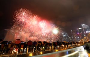 Rain falls at the Marina Bay ahead of the New Year in Singapore